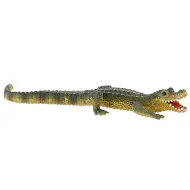 Giovane figura giocattolo di alligatore