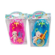 Vasca da bagno con bambino e altri accessori vari