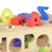 Beilaluna: Carro trainabile in legno con forme e lettere