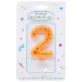 Candela a forma di numero 2 con stelle