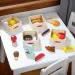 Melissa &amp; Doug: Alimenti in cassette di legno - Set di gioco Spin Master