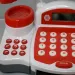 Registratore di cassa elettrico rosso con funzioni, denaro finto, prodotti e suoni