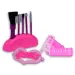 Set di bellezza rosa a 7 pezzi con pennelli per trucco, asciugacapelli e accessori.