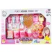 Set di dolci per festa con ciambelle, waffle e accessori