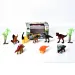 Set di giocattoli di dinosauri con dinosauri e palme